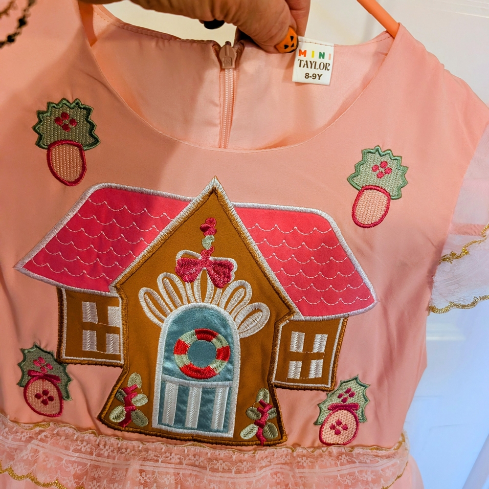 Pink Dress with Gingerbread House Design